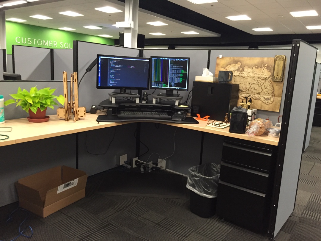 Two monitors on a sit/stand desk